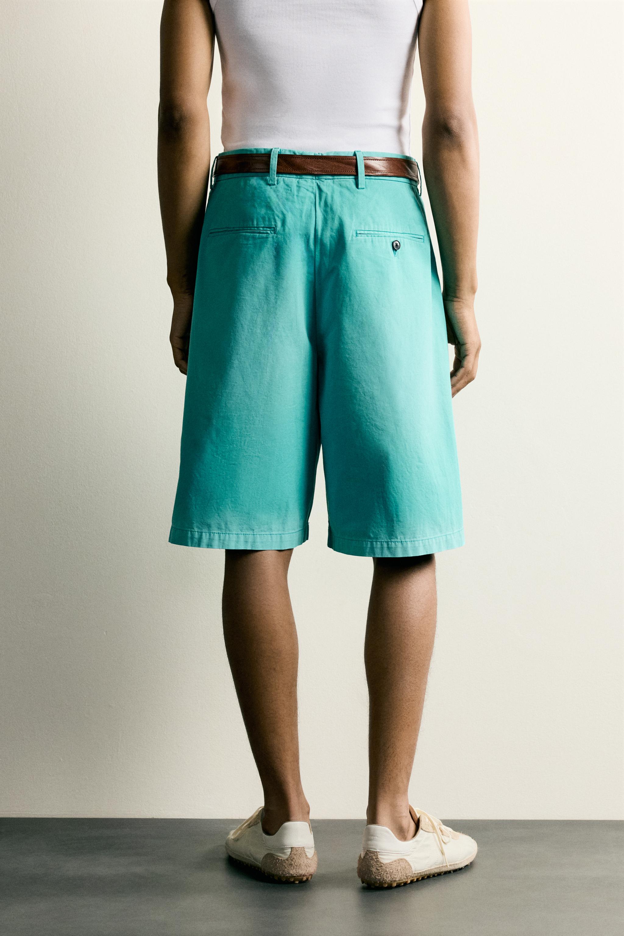WASHED PLEATED RELAXED FIT SHORTS